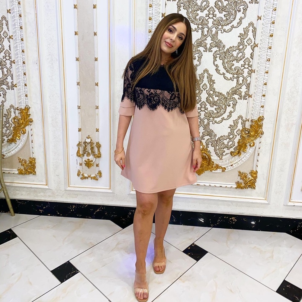 Pink dress with black lace detailing